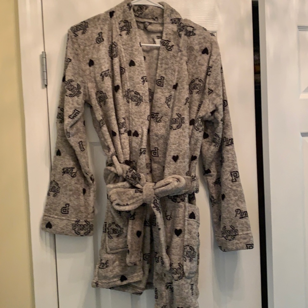 Pink robe brand new with tags in plastic xs/s